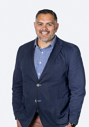 reid-cooper-grey-img-director-warren-2026 reid-cooper-grey-img-director-warren-2026